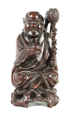 Lot 224 - A LATE 19TH CENTURY CHINESE CARVED HARDWOOD FIGURE O F A SEATED BUDDHA
