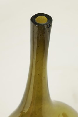 Lot 35 - AN UNUSUAL 18TH CENTURY GREEN GLASS DECANTER