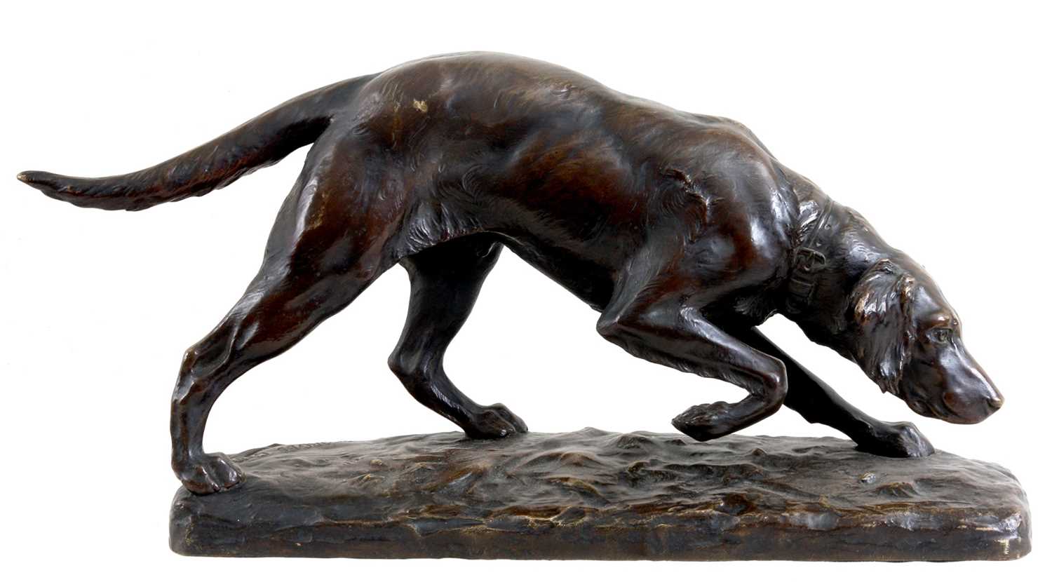 Lot 567 - A 19TH CENTURY PATINATED BRONZE of a gun dog...