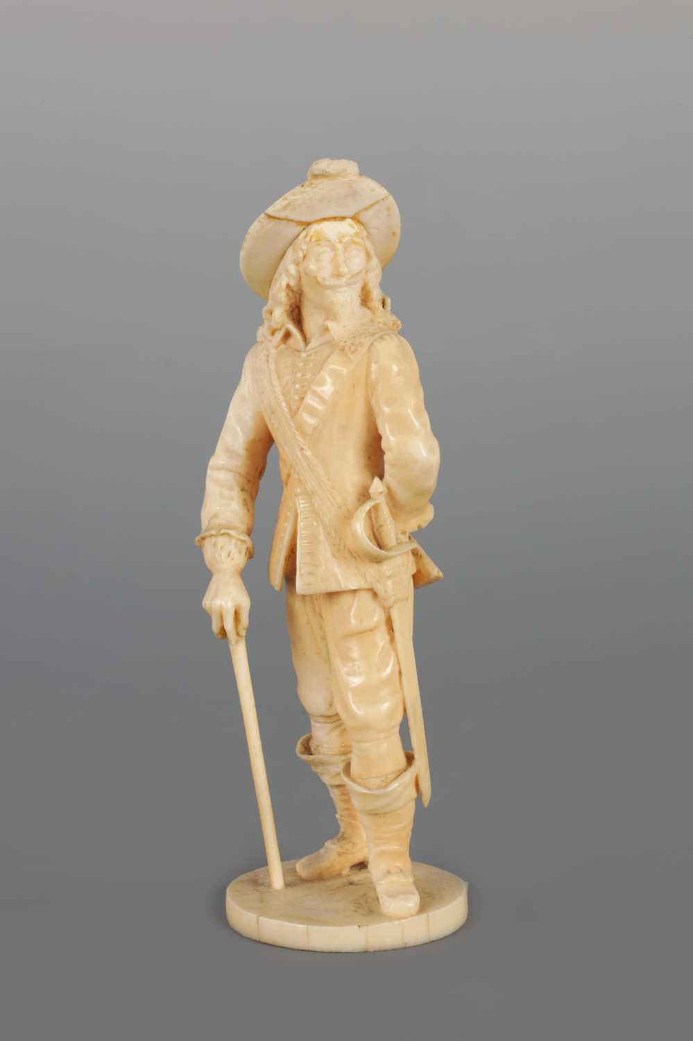 Lot 103 - AN IVORY DIEPPE CARVED FIGURE OF A CAVALIER