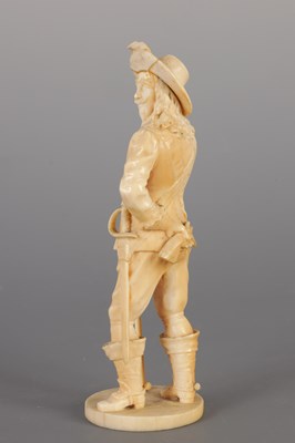 Lot 103 - AN IVORY DIEPPE CARVED FIGURE OF A CAVALIER