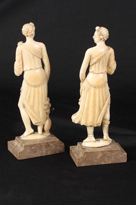 Lot 167 - A PAIR OF LATE 19TH CENTURY NEO-CLASSICAL CARVED IVORY STATUES