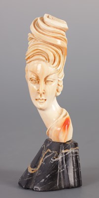Lot 210 - AN ART NOUVEAU CARVED IVORY BUST OF A YOUNG LADY