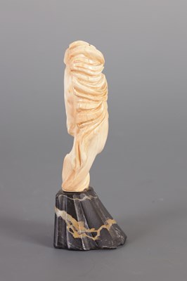 Lot 210 - AN ART NOUVEAU CARVED IVORY BUST OF A YOUNG LADY