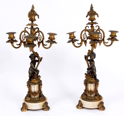 Lot 490 - A PAIR OF 19TH CENTURY BRONZE AND GILT BRONZE...