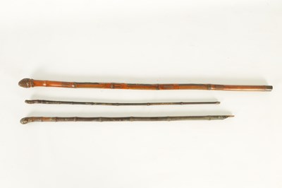 Lot 127 - A COLLECTION OF THREE MEIJI PERIOD JAPANESE BAMBOO WALKING CANES