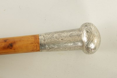 Lot 121 - A COLLECTION OF FOUR SILVER-HANDLED WALKING STICK