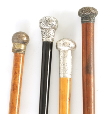 Lot 291 - A COLLECTION OF THREE SILVER MOUNTED HORN HANDLED WALKING STICK