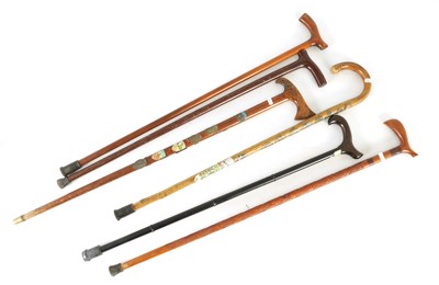 Lot 469 - A COLLECTION OF SIX WALKING STICKS