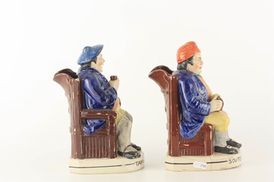 Lot 48 - A PAIR OF COLOURFUL SEATED STAFFORDSHIRE TOBY JUGS