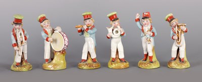 Lot 222 - A SET OF SIX GERMAN PORCELAIN BAND FIGURINES