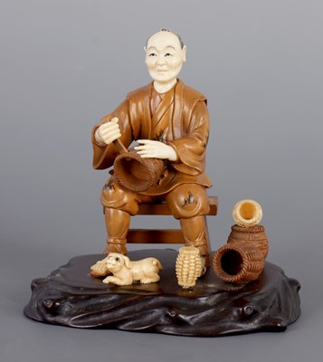 Lot 296 - A JAPANESE MEIJI PERIOD IVORY AND WOOD OKIMONO