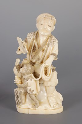 Lot 240 - A JAPANESE MEIJI PERIOD IVORY OKIMONO