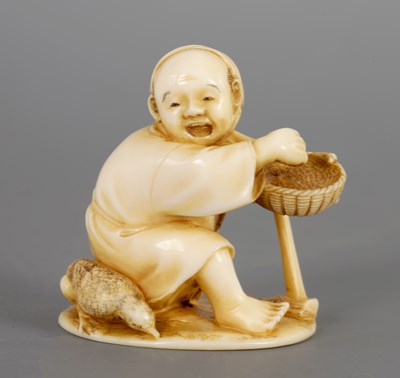 Lot 203 - A JAPANESE MEIJI PERIOD IVORY TOKYO SCHOOL NETSUKE