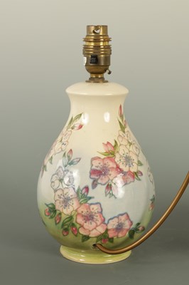 Lot 140 - A PAIR OF MOORCROFT LAMPS IN THE SPRING BLOSSOM DESIGN