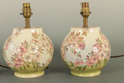 Lot 102 - A PAIR OF MOORCROFT LAMPS IN THE SPRING BLOSSOM DESIGN