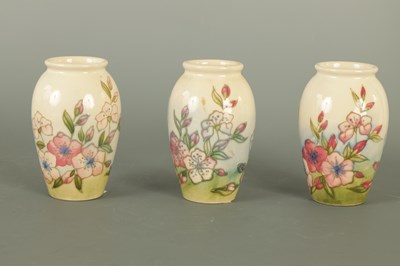 Lot 18 - A COLLECTION OF SIX MOORCROFT SPRING BLOSSOM PATTERN AND ANOTHER