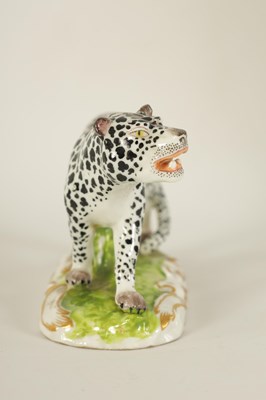 Lot 30 - A 19TH CENTURY STAFFORDSHIRE FIGURE OF A LEOPARD