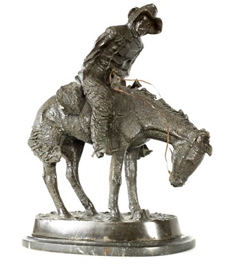 Lot 691 - AFTER FREDERIC REMINGTON. A 20TH CENTURY PATINATED BRONZE SCULPTURE