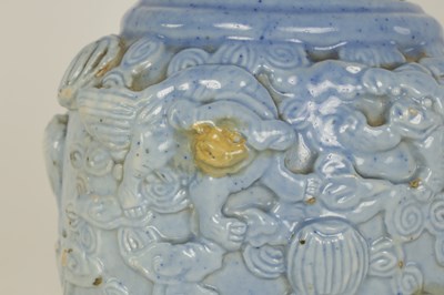 Lot 100 - A 19TH CENTURY PALE BLUE GLAZED RELIEF MOULDED CHINESE PORCELAIN VASE