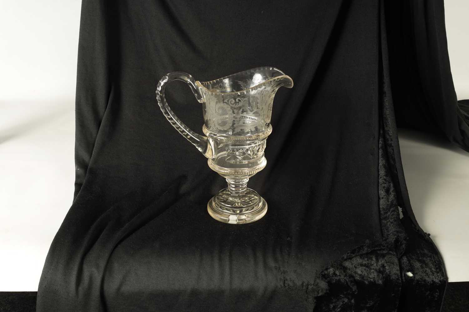 Lot 26 - A 19TH CENTURY CUT GLASS WATER JUG POSSIBLY IRISH
