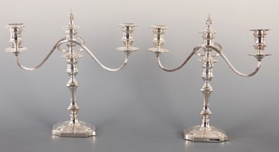 Lot 394 - A PAIR OF SILVER PLATED TWO BRANCH CANDELABRA