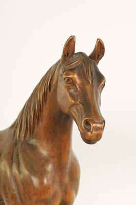 Lot 561 - A LATE 19TH CENTURY SWISS CARVED WOOD EQUESTRIAN SCULPTURE