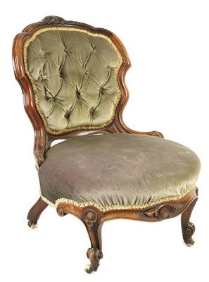 Lot 943 - A VICTORIAN WALNUT NURSING CHAIR