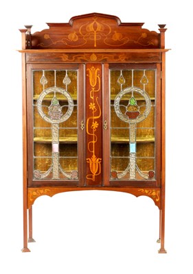 Lot 967 - AN ART NOUVEAU MAHOGANY INLAID AND STAINED GLASS DISPLAY CABINET