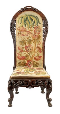 Lot 1059 - A VICTORIAN CARVED ROSEWOOD NURSING CHAIR