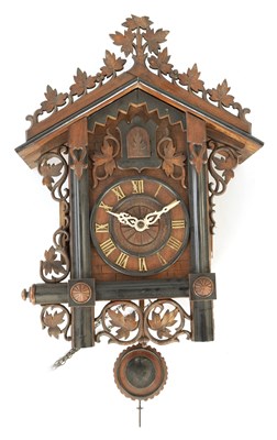 Lot 842 - A 19TH CENTURY BLACK FOREST CUCKOO CLOCK