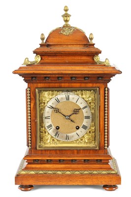 Lot 819 - A LATE 19TH CENTURY GERMAN WALNUT ORMOLU MOUNTED BRACKET CLOCK