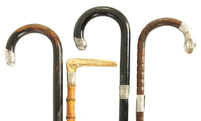 Lot 478 - A COLLECTION OF FOUR WALKING STICKS