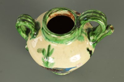 Lot 82 - AN EARLY 20TH CENTURY FRENCH POTTERY WINE EWER