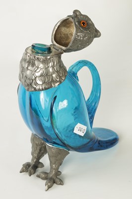 Lot 125 - A 19TH CENTURY BLUE GLASS CLARET JUG IN THE FORM OF AN OWL