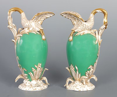 Lot 47 - A PAIR OF 19TH CENTURY PORCELAIN EWERS