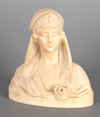 Lot 683 - A SMALL ART NOUVEAU CARVED ALABASTER BUST