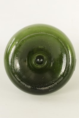Lot 15 - AN 18TH CENTURY GREEN GLASS ONION SHAPED WINE BOTTLE