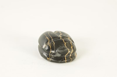 Lot 578 - A BLACK VARIEGATED MODEL OF A SCARAB BEETLE