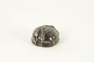 Lot 578 - A BLACK VARIEGATED MODEL OF A SCARAB BEETLE