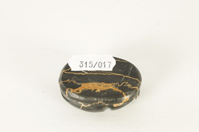 Lot 578 - A BLACK VARIEGATED MODEL OF A SCARAB BEETLE