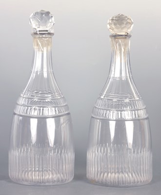 Lot 19 - A PAIR OF GEORGIAN MALLET SHAPED CUT GLASS DECANTERS