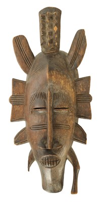 Lot 571 - AN EARLY 20TH CENTURY AFRICAN TRIBAL CARVED WOOD MASK