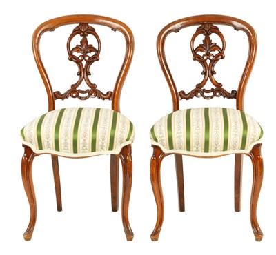 Lot 1079 - A PAIR VICTORIAN ROSEWOOD BALLON BACK CHAIRS