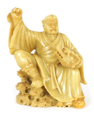 Lot 341 - A LATE 19TH CENTURY CHINESE CARVED SOAPSTONE FIGURE