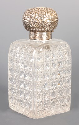 Lot 446 - A LARGE VICTORIAN SILVER TOPPED CUT GLASS SCENT BOTTLE