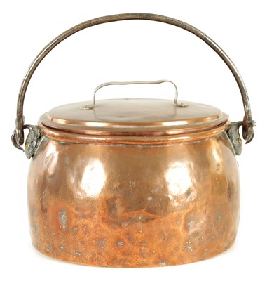 Lot 541 - AN 18TH CENTURY IRON AND COPPER OVAL LIDDED COOKING POT