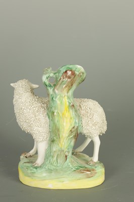 Lot 118 - A 19TH CENTURY STAFFORDSHIRE FIGURAL SPILL VASE