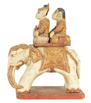 Lot 188 - AN EARLY 20TH CENTURY CARVED INDIAN ELEPHANT
