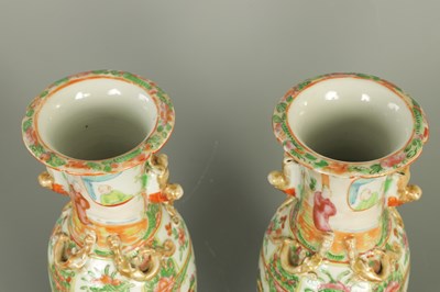 Lot 213 - A PAIR OF 19TH CENTURY CANTON FAMILLE ROSE BALUSTER VASES